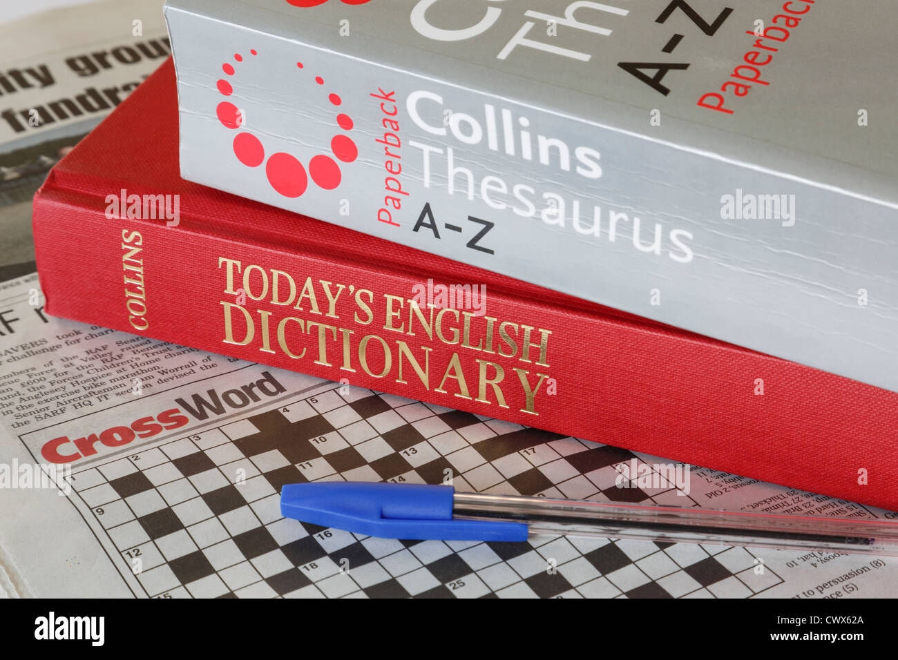 Collins A Z Thesaurus And Today s English Dictionary Books With A Newspaper Crossword Puzzle And Pen England UK Britain Stock Photo Alamy
